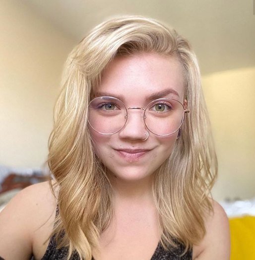 Golden blonde with a soft side part