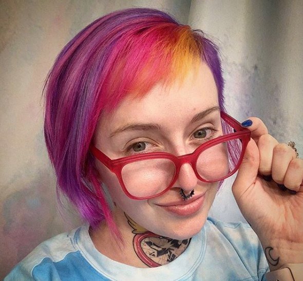 Hot pink and violet fashion color on a short cut